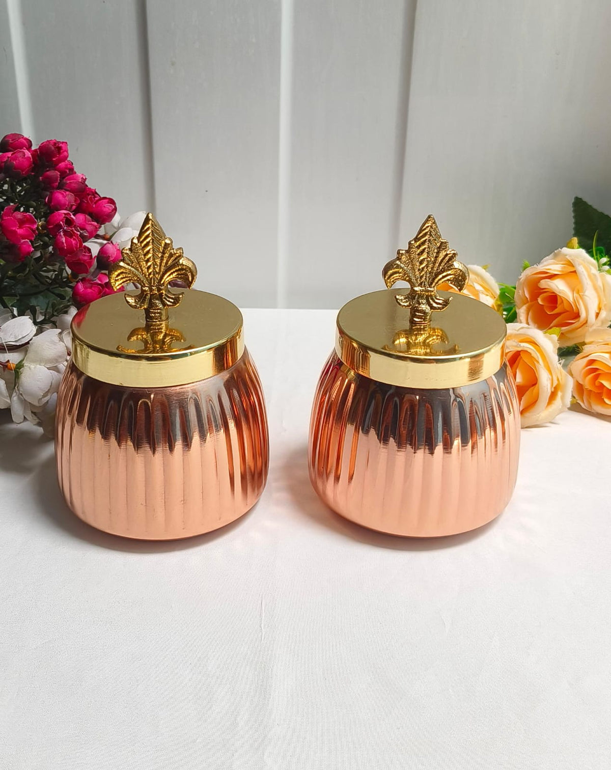 Maverics copper finish storage jars with golden finial lids, set of 2
